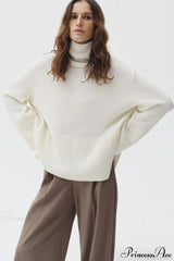 Slit Loose Knit Turtleneck Solid Sweater